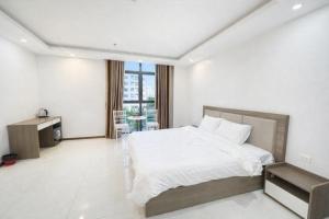 Ένα ή περισσότερα κρεβάτια σε δωμάτιο στο HN Hotel Bắc Ninh +20 φωτογραφίες