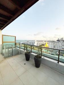 Ban công/sân hiên tại Duplex de luxo com hidro by Day by Day no Atlantis