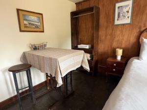 En eller flere senge i et værelse på Cabañas en el Bosque a 5 minutos del mar - Estancia CH