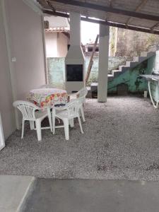 TV a/nebo společenská místnost v ubytování Lar Armação