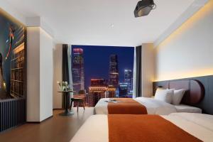 重庆Merica Hotel-ChongQing jiefangbei的市景客房 - 带2张床