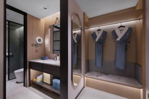 Koupelna v ubytování Shenyang Olympic Sports Center Manxin Hotel