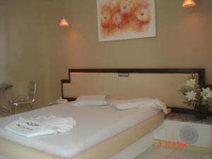 Postel nebo postele na pokoji v ubytování Hotel Don Juan