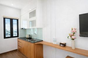 Kuchyň nebo kuchyňský kout v ubytování TD Apartment