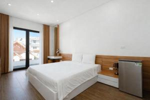 Postel nebo postele na pokoji v ubytování TD Apartment