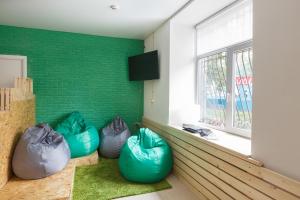 a room with three bean bags in front of a window at Nice Hostel Paveletskaya in Moscow