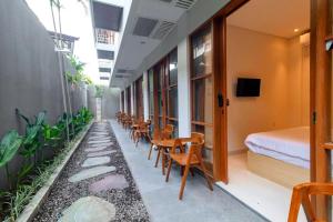 TV/trung tâm giải trí tại AA Inn Kuta Beach