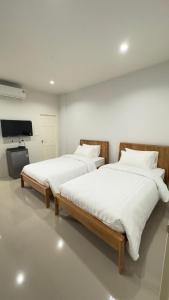 Postel nebo postele na pokoji v ubytování Airport Stay Phuket Zz + 4 fotografie