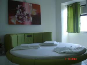 Postel nebo postele na pokoji v ubytování Hotel Don Juan