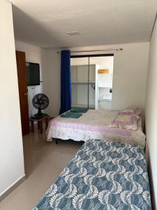 Postel nebo postele na pokoji v ubytování Casa inteira com três quartos, piscina aquecida por energia solar e área de churrasqueira