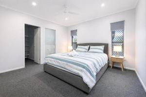 En eller flere senge i et værelse på Getaway on the Green in Townsville