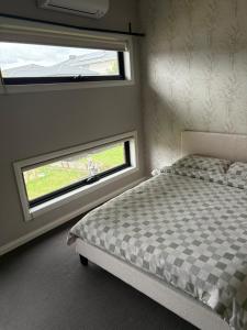 Ένα ή περισσότερα κρεβάτια σε δωμάτιο στο Kal's B&B