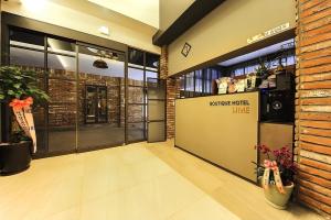 a entrance to a store with a front door at The Lime Hotel in Incheon