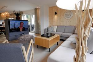 TV a/nebo společenská místnost v ubytování First-Class Domizil WILLINGEN-LODGE in zentraler Lage!