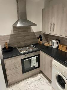 Køkken eller tekøkken på The Cotes Suite by Nestura