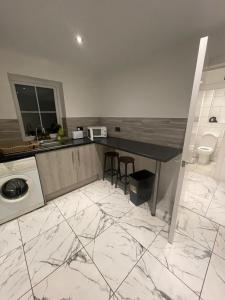 Køkken eller tekøkken på The Cotes Suite by Nestura