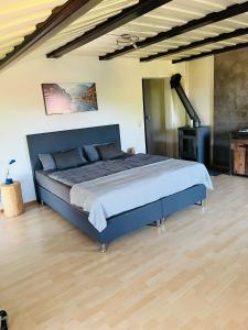 En eller flere senge i et værelse på Naturhof Selbertinger