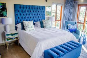 En eller flere senge i et værelse på 156 Euphoria Boutique Villa - Euphoria Golf Estate Hydro