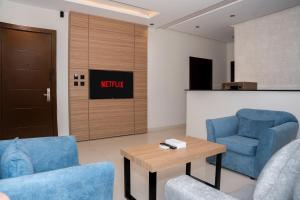 Posezení v ubytování ارجان بارك الحمراء