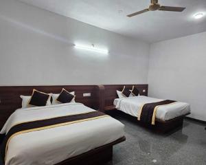 Giường trong phòng chung tại POP 84155F The Pride