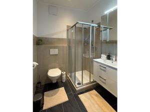 Koupelna v ubytování Lucy s Studio Apartment Kössen