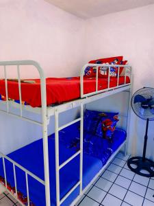 Giường trong phòng chung tại Griya Backpacker Pak yon