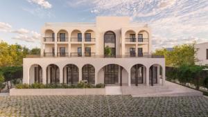 美西尼克利奥佩特拉酒店的白色建筑的 ⁇ 染