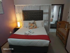 En eller flere senge i et værelse på Clearview Estuary Apartment 3