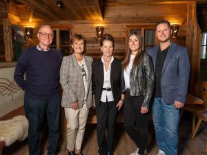 a group of people posing for a picture in a cabin at Moonlight Apartments in Söll +52 photos