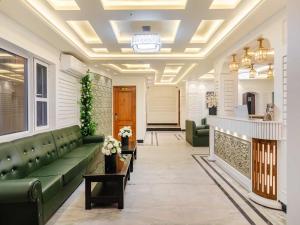 Et opholdsområde på Palette Hotel Cecil by CheckIn Srinagar