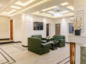 Et opholdsområde på Palette Hotel Cecil by CheckIn Srinagar