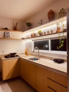 Køkken eller tekøkken på Casa Vista Mar - Praia do Frances