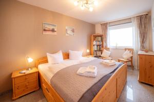 Postel nebo postele na pokoji v ubytování Schnuckeliges Appartement