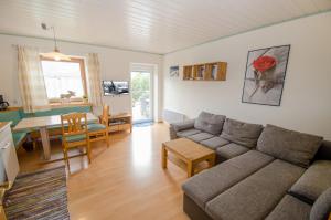 A seating area at Appartementhaus LAKE VIEW by All in One Apartments
