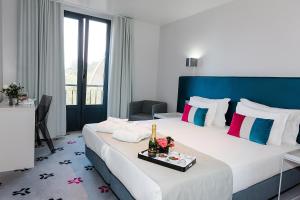 Letto o letti in una camera di Sintra Bliss Hotel