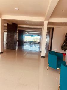 a lobby with a view of a dining room at Trident Sea Hotel in Negombo +60 photos