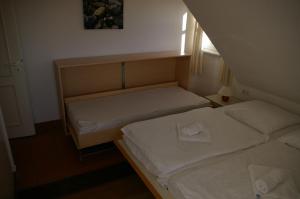 Postel nebo postele na pokoji v ubytování Treibgut & Surf