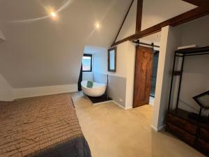 En eller flere senge i et værelse på Hotel Aardenburg + 7 billeder