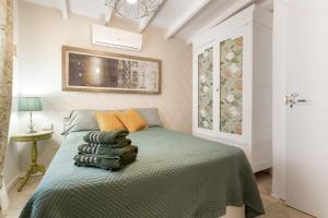 En eller flere senge i et værelse på Mi casita de Chimaca