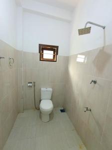 Phòng tắm tại Abhilashi Guest house +27 ảnh