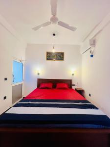 Giường trong phòng chung tại DNS Villa