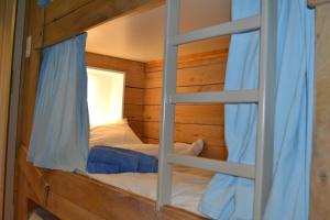 Postel nebo postele na pokoji v ubytování Chalet Le Forestier