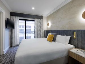 Postel nebo postele na pokoji v ubytování The Sebel Melbourne Flinders Lane + 35 fotografií