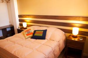 Postel nebo postele na pokoji v ubytování Wayqey Lodge
