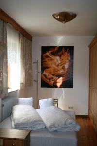 Postel nebo postele na pokoji v ubytování Ferienwohnung Jauß