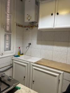 Køkken eller tekøkken på Lafayette Central Apartment