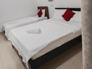 Postel nebo postele na pokoji v ubytování Drizzle Ridge Villa