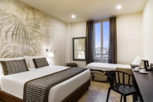 a hotel room with two beds and a desk at Best Western Plus Royal Superga Hotel in Cuneo +35 photos