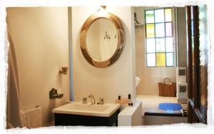 a bathroom with a sink and a mirror on the wall at La Mamunia in Las Gaviotas +89 photos