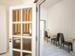 Postel nebo postele na pokoji v ubytování Nicolai Lounge Loft